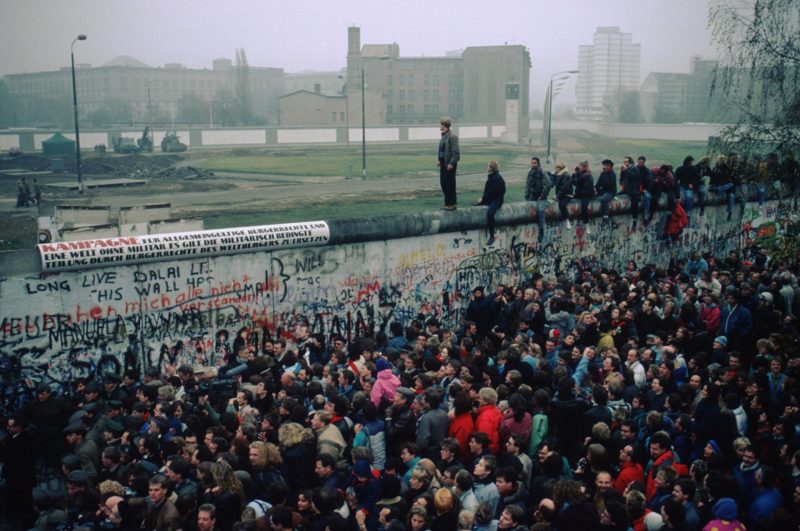 People around Berlin Wall